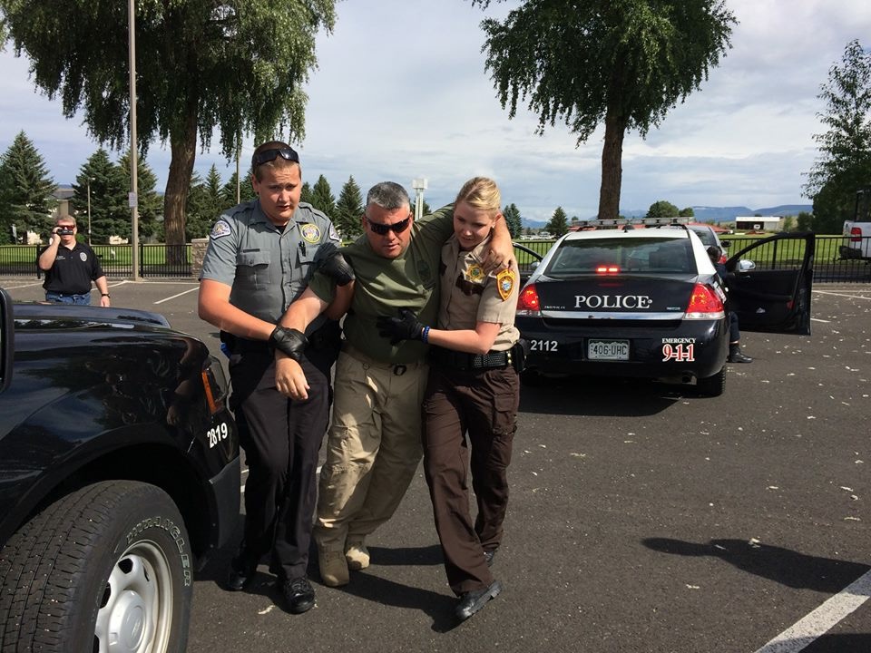MCSO cadet helping victim.